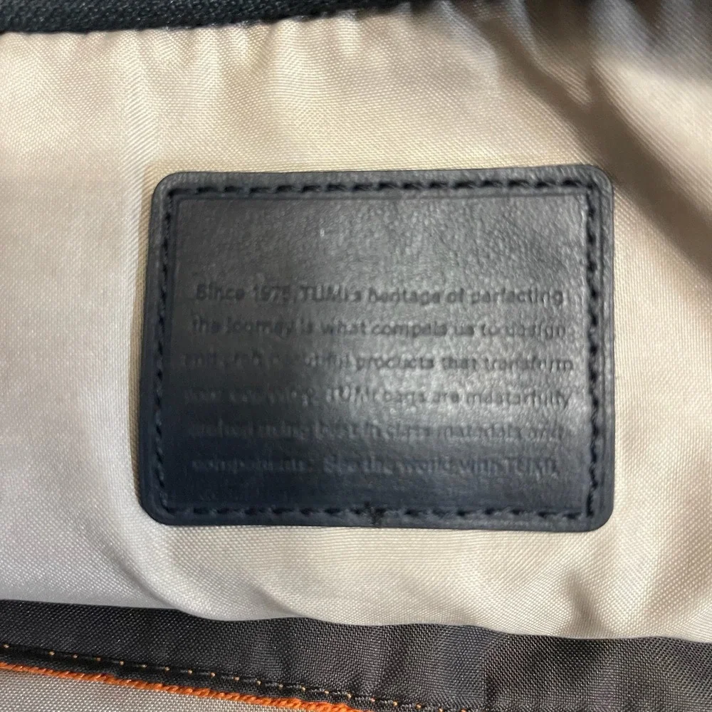 Tumi adjustable backpack